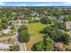 Spacious grassy lot offers abundant sunshine and room for outdoor activities in a quiet residential neighborhood surrounded by trees at 5312 Kingswood Dr, Orlando, FL 32810