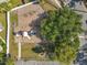 Overhead shot of a park playground featuring swings, slides, climbing structures, and shade trees at 5312 Kingswood Dr, Orlando, FL 32810