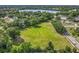 Spacious grassy lot offers abundant sunshine and room for outdoor activities in a quiet residential neighborhood surrounded by trees at 5312 Kingswood Dr, Orlando, FL 32810