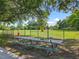 Picturesque community park featuring picnic tables and an open green space for recreation at 5312 Kingswood Dr, Orlando, FL 32810