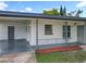 Charming single-story home with a covered front porch and well-maintained exterior at 5312 Kingswood Dr, Orlando, FL 32810