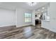 Inviting living room with durable wood flooring and natural light at 5312 Kingswood Dr, Orlando, FL 32810