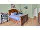 Comfortable bedroom with a king bed and modern decor at 651 Regina Cir, Oakland, FL 34787