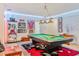 Basement with a pool table, display case, and LED lighting at 6808 Goldflower Ave, Harmony, FL 34773