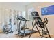 Home gym with treadmill, exercise ball, and elliptical at 6808 Goldflower Ave, Harmony, FL 34773