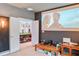 Second living area with a movie projection screen adjacent to the game room at 6808 Goldflower Ave, Harmony, FL 34773