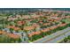 Aerial view of the Crestwynd community showcasing layout, pool, and surrounding area at 7638 Long Island Dr, Kissimmee, FL 34747