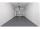 Attached garage with ample space and a functional garage door opener provides secure parking at 7920 Draw St, Reunion, FL 34747