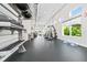 Modern gym with free weights, weight machines, and ample room for activities at 7920 Draw St, Reunion, FL 34747