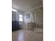 Bright bathroom features a shower with glass door, and soaking tub under a window at 7971 Brofield Ave, Windermere, FL 34786