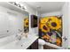 Full bathroom featuring a vanity with countertop, toilet, and shower with decorative sunflower curtain at 8 Orchid Ct, Kissimmee, FL 34759