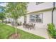 A home's backyard features a dining area, providing a tranquil setting for relaxation and outdoor meals at 816 Longboat Dr, Davenport, FL 33896