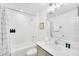 Clean bathroom features a shower-tub combination and a white vanity with countertop at 816 Longboat Dr, Davenport, FL 33896