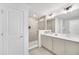 Modern bathroom features tile floors, double sinks, and a glass enclosed shower at 816 Longboat Dr, Davenport, FL 33896