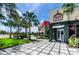 The retail store offers a variety of dining and shopping options, set amidst lush greenery at 816 Longboat Dr, Davenport, FL 33896