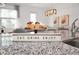 Granite kitchen island showcases an 