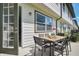 This patio features a table with seating for six and is perfect for outdoor entertaining at 816 Longboat Dr, Davenport, FL 33896