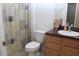 Cozy bathroom equipped with shower/tub combo, a vanity, and essential fixtures in neutral tones at 10722 Clover Walk Dr, Orlando, FL 32825