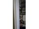 Organized closet with neatly folded towels and linens, showcasing ample storage space for a tidy and clutter-free home at 10722 Clover Walk Dr, Orlando, FL 32825