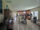 Large living area showcases dining table, kitchen, and comfortable seating at 10722 Clover Walk Dr, Orlando, FL 32825