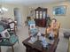 Spacious living room boasts an open layout, tile flooring, and an abundance of natural light and elegant furnishings at 10722 Clover Walk Dr, Orlando, FL 32825