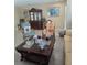 Cozy living room with plush furniture, a glass top coffee table, and decorative art pieces at 10722 Clover Walk Dr, Orlando, FL 32825