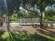 Community mailboxes with mature trees and landscaping, offering a convenient and attractive location at 10722 Clover Walk Dr, Orlando, FL 32825