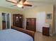 The main bedroom offers ample storage, and a neutral color scheme, creating a serene and inviting space at 10722 Clover Walk Dr, Orlando, FL 32825