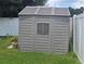 Durable outdoor shed in backyard, great for storage and organization of lawn and garden equipment at 10722 Clover Walk Dr, Orlando, FL 32825