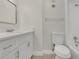 Updated bathroom with vanity, toilet, and shower/tub combo with white subway tile at 12155 Pepperdine Pl, Orlando, FL 32826