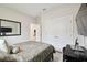 Relaxing bedroom featuring white closet doors and a TV area for a cozy ambiance at 1309 Lombardi Ct, Kissimmee, FL 34759