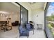 Covered patio with comfortable seating and a grill, perfect for outdoor dining at 1309 Lombardi Ct, Kissimmee, FL 34759