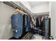 Spacious walk-in closet featuring organized shelving and ample storage for clothes and shoes at 1309 Lombardi Ct, Kissimmee, FL 34759