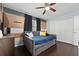 Spacious bedroom offers ample closet space and a relaxing retreat with room for sleeping and lounging at 13129 Cog Hill Way, Orlando, FL 32828