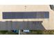 Detailed aerial view of solar panels installed on the roof of a home at 1383 Buckeye Trace Blvd, Winter Haven, FL 33881