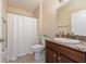 Full bathroom features shower, vanity, and neutral colored walls at 1383 Buckeye Trace Blvd, Winter Haven, FL 33881