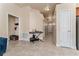 Long hallway with tiled flooring, connecting different areas of the house at 1383 Buckeye Trace Blvd, Winter Haven, FL 33881