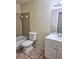 Bathroom with tub, tile and updated vanity at 141 Varner Sw Dr, Winter Haven, FL 33880