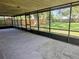 Enjoy outdoor living on this screened patio overlooking a large backyard at 141 Varner Sw Dr, Winter Haven, FL 33880