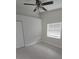 Cozy bedroom with tile flooring, ceiling fan, and natural light at 1415 Zenith Pl, Orlando, FL 32808