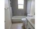 Modern bathroom with tiled shower-tub combo and white vanity with sink at 15 Clear Way, Ocala, FL 34472