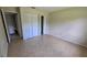 Bedroom featuring tile floors and folding closet doors at 15 Clear Way, Ocala, FL 34472