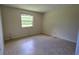 Bedroom with tile floors and a bright window at 15 Clear Way, Ocala, FL 34472
