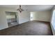 Spacious living room with carpet flooring and ample natural light at 15 Clear Way, Ocala, FL 34472