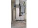 Image shows the home's water heater and air conditioning unit at 15 Clear Way, Ocala, FL 34472