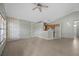 Spacious living room with bright laminate flooring and a ceiling fan at 1506 Brookebridge Dr, Orlando, FL 32825