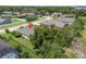 Aerial view of the home with landscaping, backyard, and neighborhood surroundings at 1525 Gants Cir, Kissimmee, FL 34744