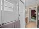 Bright bathroom features a glass enclosed shower with a neutral colored towel hanging on the door at 1525 Gants Cir, Kissimmee, FL 34744