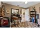 Inviting bedroom with a writing desk, mirror, rug, and decorative elements at 1525 Gants Cir, Kissimmee, FL 34744