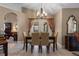 Cozy dining area with a chandelier and natural light at 1525 Gants Cir, Kissimmee, FL 34744